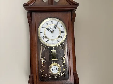 Brown Antique Clocks & Repair