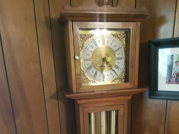 Son and Father Time Clock Repair